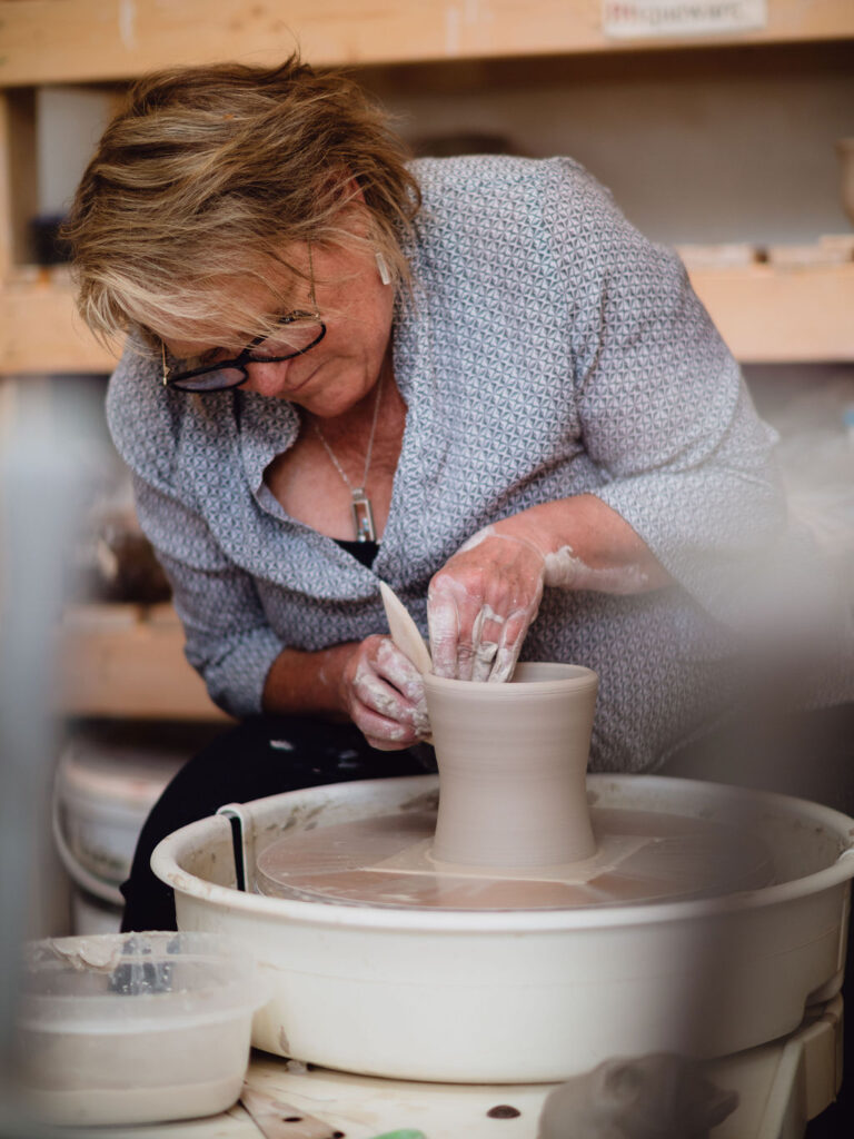 Diane Walters demonstrating pottery technique